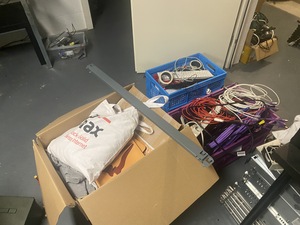Boxes full of cables and schwag