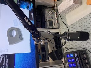 The mailman came, and delivered a Rode mic arm. It's really fancy, with springs and wire guides. But my mic doesn't ... fit