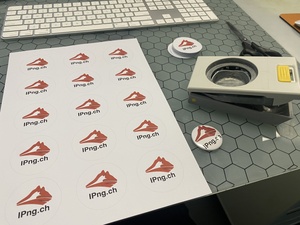Marina has printed a bunch of IPng logos on a template with circles, 2 inches wide. I'll cut in total 120 of these.