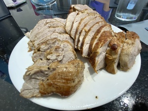 The pork filet looks tasty, and it is accompanied by mushroom sauce and sauteed mushrooms