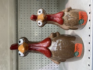 In the shop, I hesitate and want to buy these two adorable but otherwise useless (and non-floof) chickens. Marina talks me out of it.