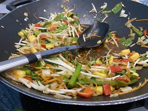 Our evening meal is simply a stirfry wok with lots-o-veg, and chicken and rice to go with it. It makes for a very nice summer dish.
