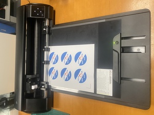 The ES Mat that arrived, fits on the front of the Cameo, and holds paper in place using electrostatic force - it works well!