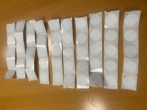 A roll of nTAG215 stickers, all written and locked