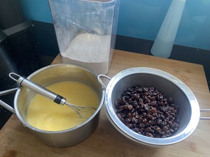 Ingredients for the Kramiek - butter, milk, raisins, flour, yeast and sugar.