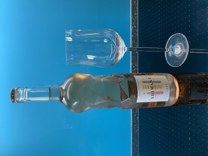 We have a rose wine today with a really funky bottle shape. Marina and I decided to keep the bottle, probably to never use again!