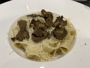 A snapshot of our absolutely fantabulous tagliatelli with black truffle and aged parmesan cheese.