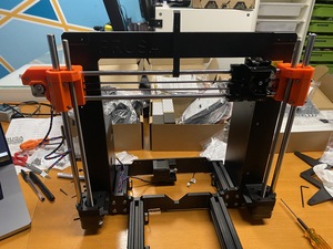 The Prusa MK4S printer is halfway done. The Z and X carriage and the bottom parts are done. This is about 1/3 of the way through the build.