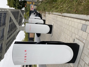 These are the v4 Superchargers, and they're quiet, nice and fast. I'm just very happy that a few years ago, WEiRD and I had the CCS charger retrofitted in this old Mennekes car. But: free charging, hellyeahb
