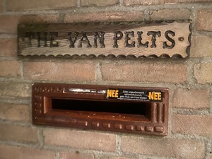 The sign at my parent's frontdoor.