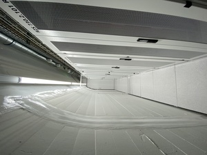 The rear of the racks is against a curved wall. In German, Stollen are underground straight tunnels. Yes, this facility is built into a hillside along the Vierwaltst&auml;dtersee