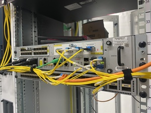 One of the two ASR9k+Nexus combos. There are two of these racks in the room, and each has its own management switch and terminal server, and also each has 2x10G to other datacenters. I don't expect much downtime inthis room...