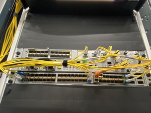 The IP-Max footprint up close. There's already quite a few fibers breaking in- and out of this router.