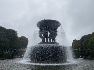 The statue of the men holding a huge fountain bowl at Frogner Park