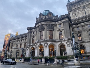 One of the street-facing arches of Palais Garnier, an italian opera house in Paris, France.
