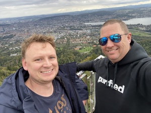 A the top of the Uetliberg transmission tower, we overlook the city and the lake and the Alps. It's windy up here, but beautiful views, despite the overcast weather