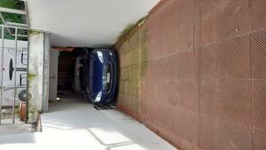 I'm driving the car through a very narrow gangway up from the garage in our hotel. No damage!