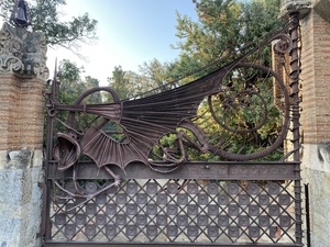 A beautiful gate at the edge of Güell Pavilions in Barcelona, Catalonia.