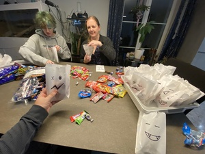 We are filling candy baggies for the trick-or-treat'ers tomorrow. We expect one hundred or so kids.